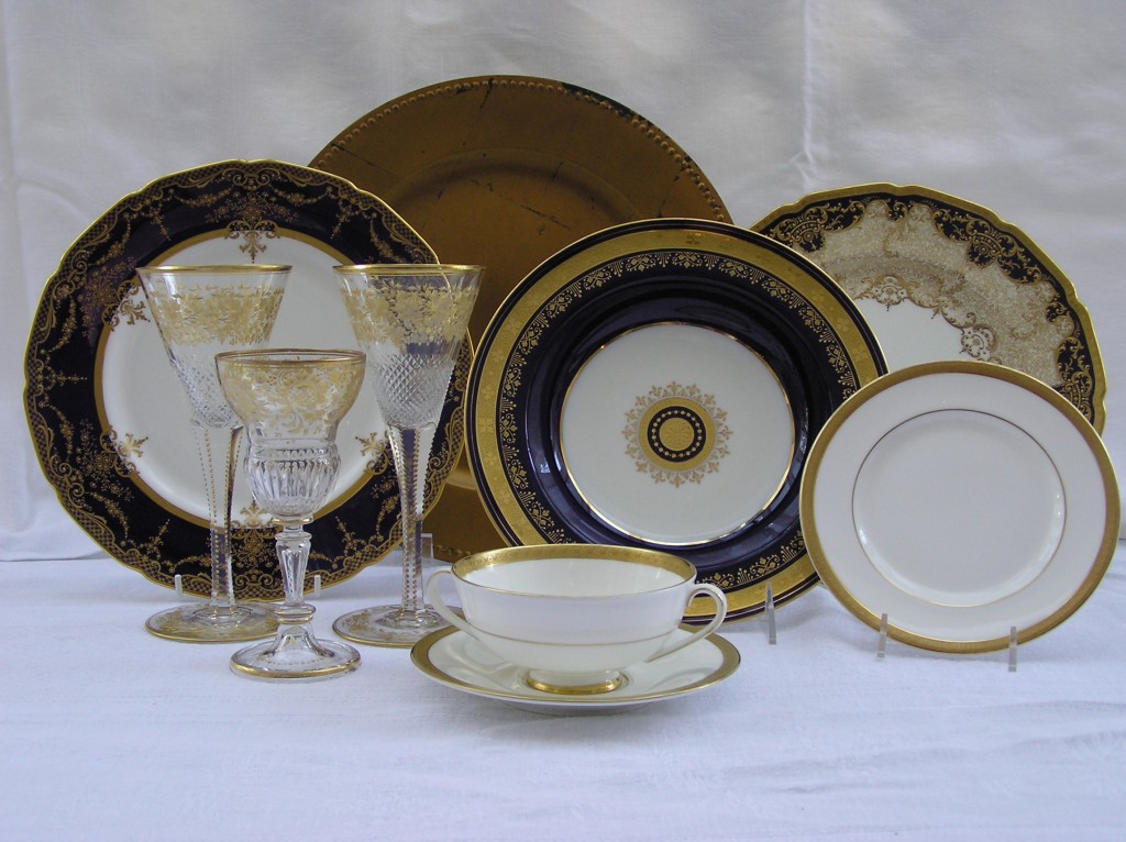 Royal Doulton cobalt-glazed service plates with gilt trim, Gilded Age design.