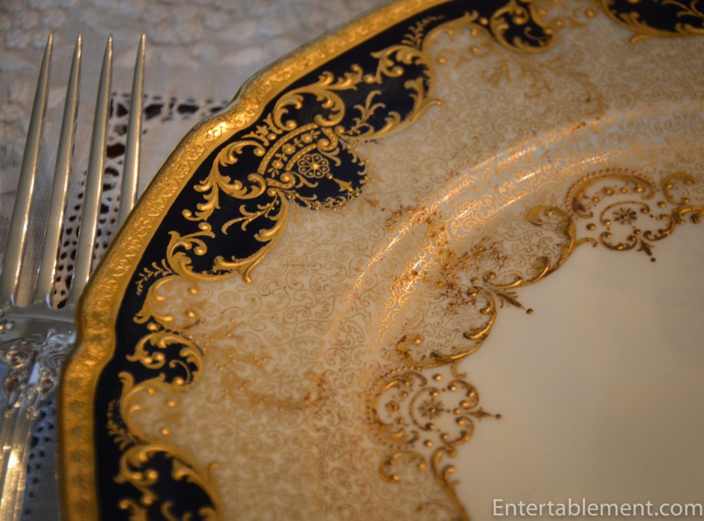 Royal Doulton cobalt-glazed service plate with gilt trim, Gilded Age design.