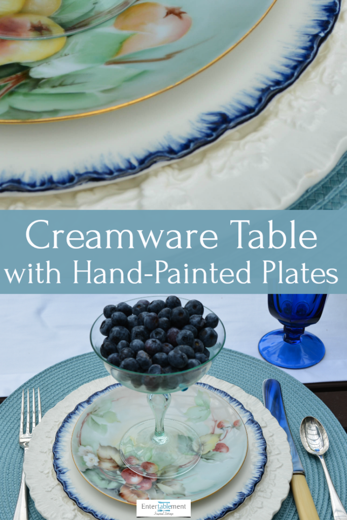 table set with shell edged creamware and hand painted berry plates