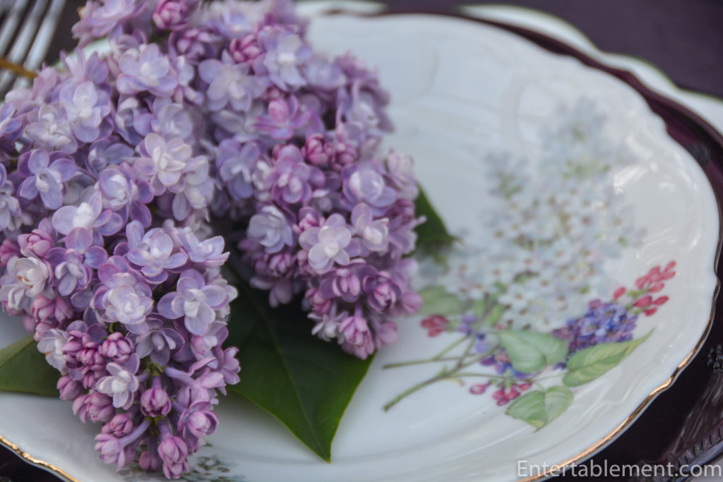 Close-up of vintage Mitterteich Lilac pattern from 1920s Bavaria, with delicate purple flowers and gilded rim.