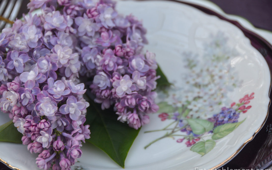 Close-up of vintage Mitterteich Lilac pattern from 1920s Bavaria, with delicate purple flowers and gilded rim.