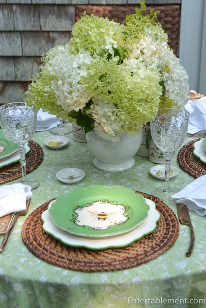 Anthropologie Nature Studies Bee salad plate featuring a detailed honeybee illustration with green border and delicate gilt decoration.