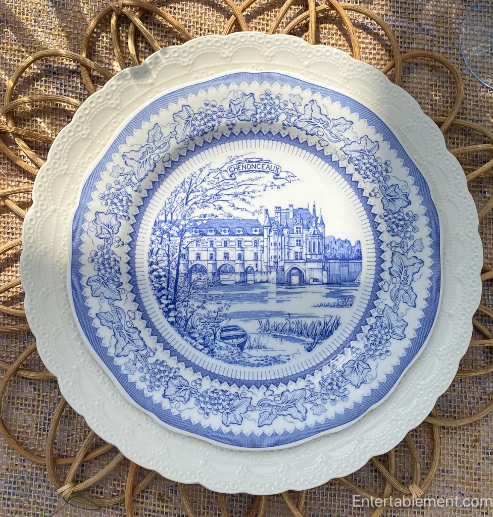 Blue and white Gien plate showing Château de Chenonceau spanning the River Cher.