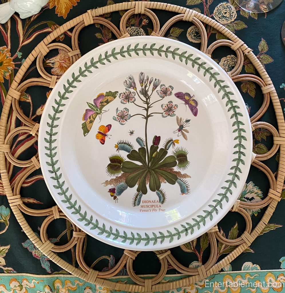 Botanic Garden plate featuring Dionaea Muscipula (Venus Fly Trap) with vibrant butterflies.