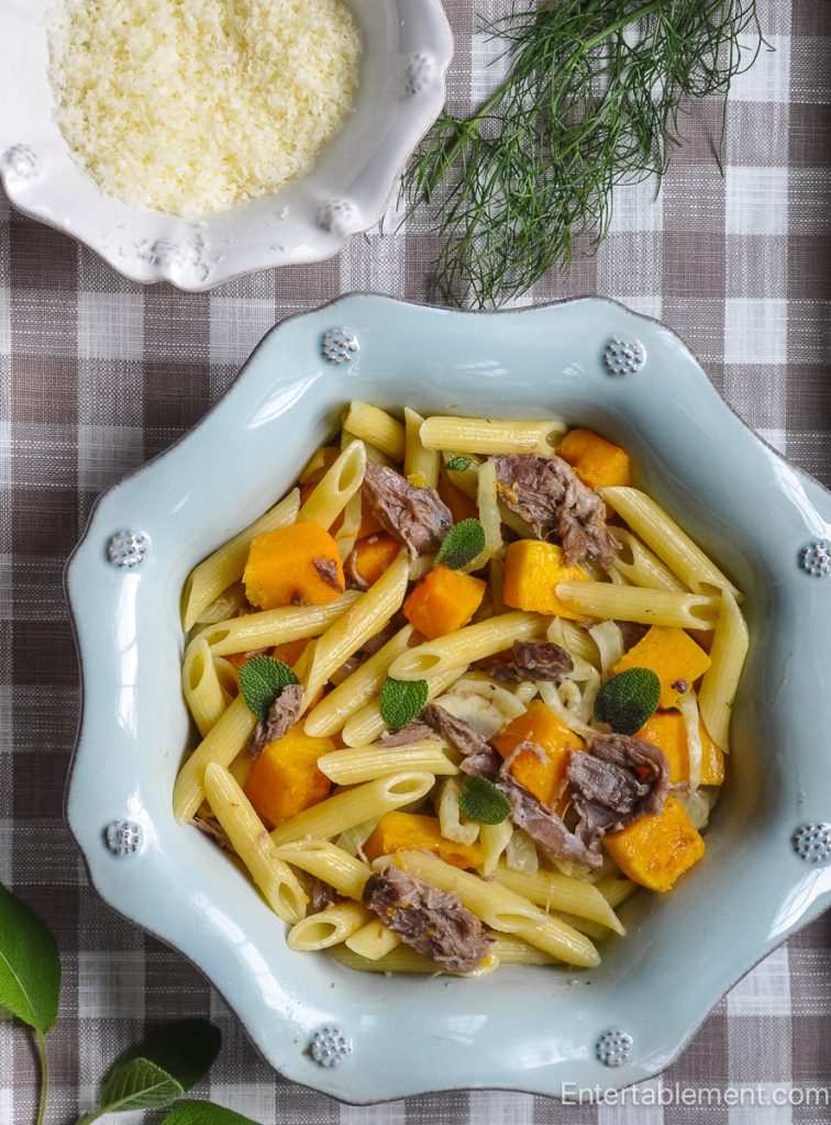 Penne pasta with duck confit, roasted butternut squash, caramelized fennel, fresh sage and Parmesan cheese.