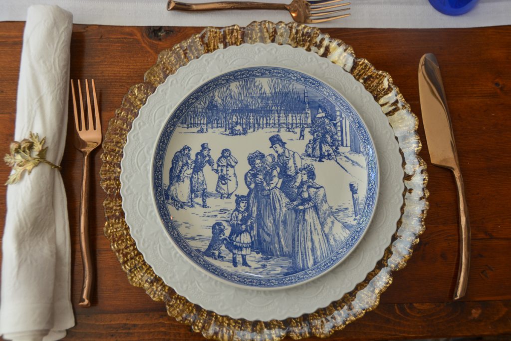 Royal Doulton Victorian Christmas series cobalt blue plate with classic 18th-century Christmas Scene.