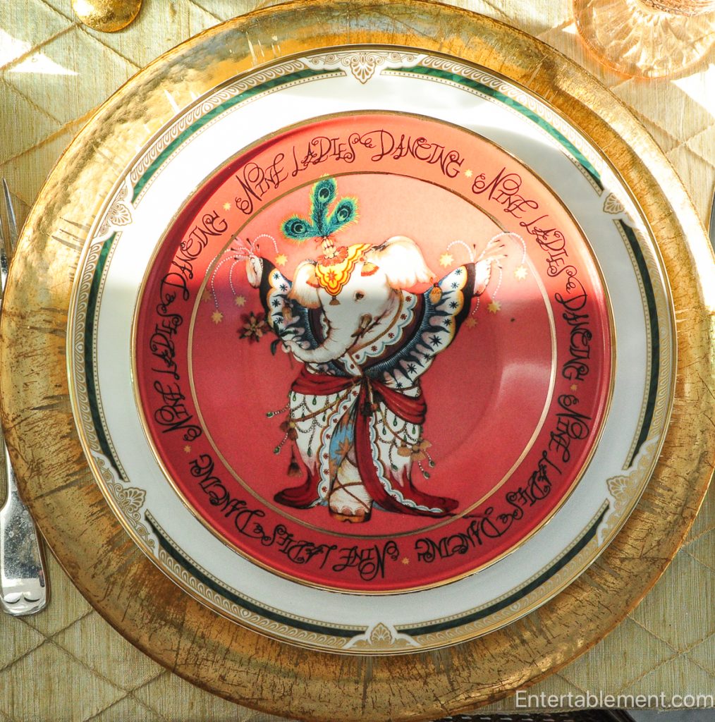 Anthropologie ‘Nine Ladies Dancing’ plate in rose pink with elaborately dressed dancing elephant figure.