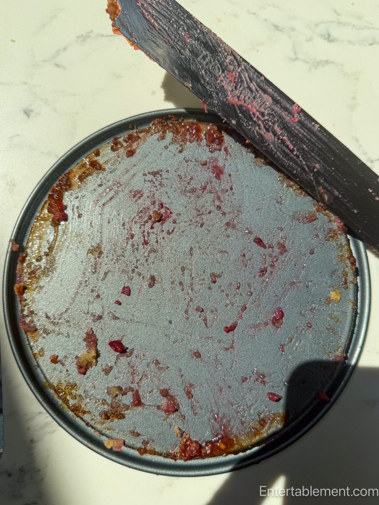 Cape Cod Cranberry Walnut Butter Cake sticking to the pan after an unsuccessful attempt to unmould it.