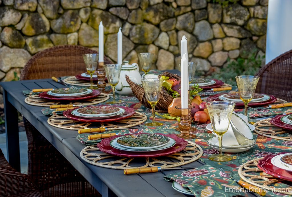 Burgundy Morris & Co. Essex plate at an autumn place setting with patterned Seasons by May linens