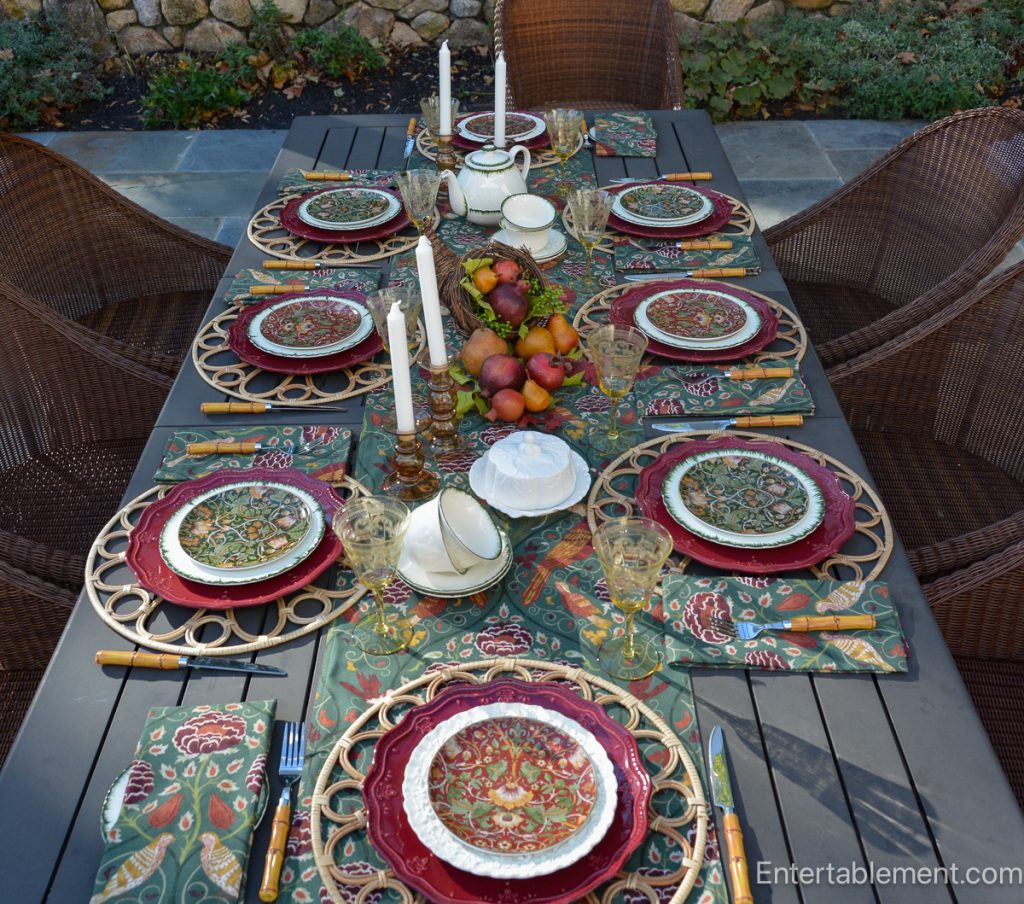 Morris & Co. Seasons by May runner with autumn fruit, amber glass and patterned china